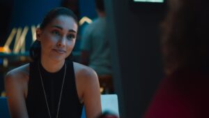 Close up of woman in mixed lighting condition at a bar