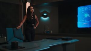 Woman in spaceship office quarters in warmly lit environment