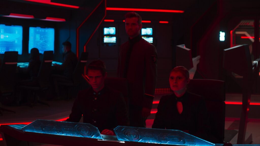 Spaceship comand deck movie set in bright red and cyan blue lighting