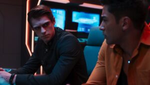 Alien figure in sci-fi series on spaceship deck