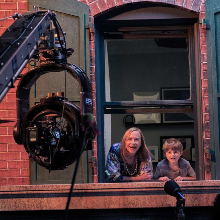 Gimbal evo head with red raptor camera filming a scene with grandmother played by amy madigan and grandson played by austin schoenfeld looking out a window for go for grandma film