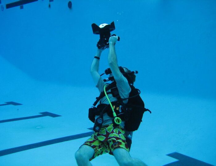 Director of Photography Maximilian Schmige filming underwater
