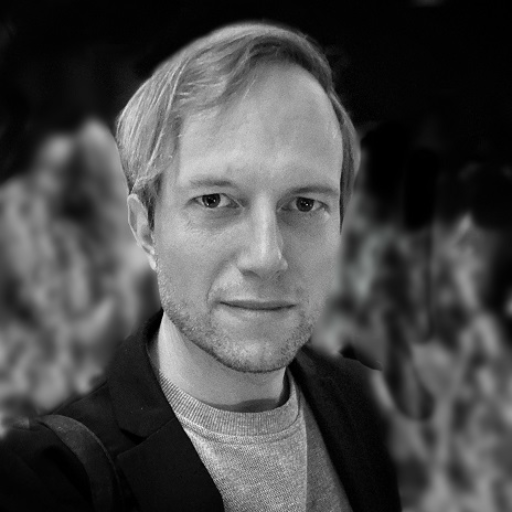 Close up of Maximilian Schmige in black and white