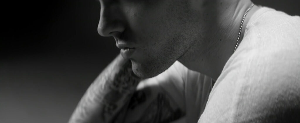 Close up silhouette shot of man in dramatic studio lighting