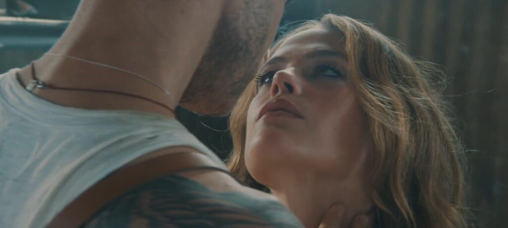 Close up on model looking at Asaf Avidan