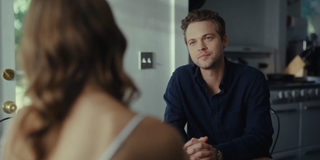 Over the shoulder shot of Alexander Calvert in Double Exposure Movie