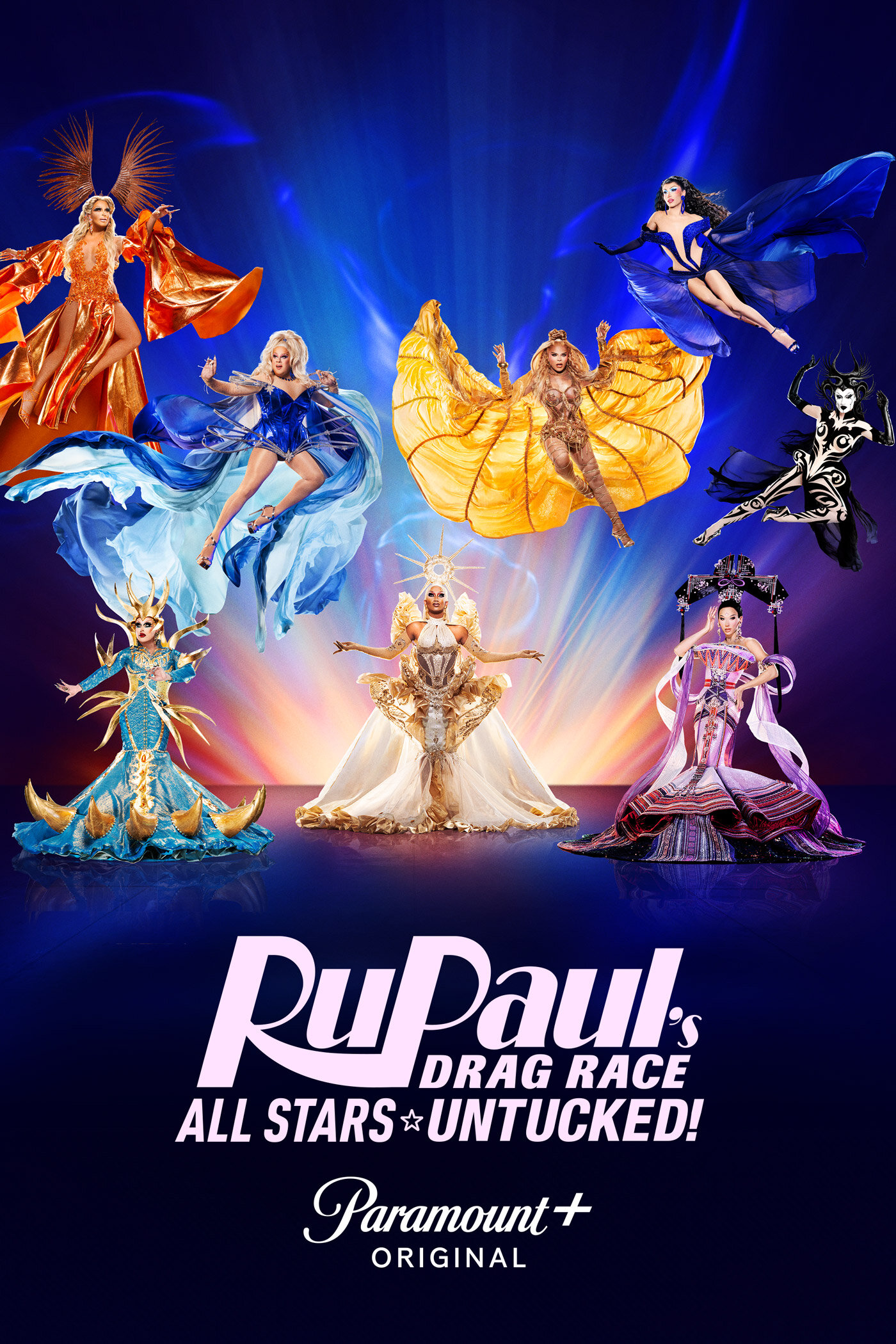 Eight colorful drag queens floating on stage in photo montage. Image redirects to website.