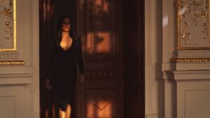 Thamina Sunny entering a room at sunset