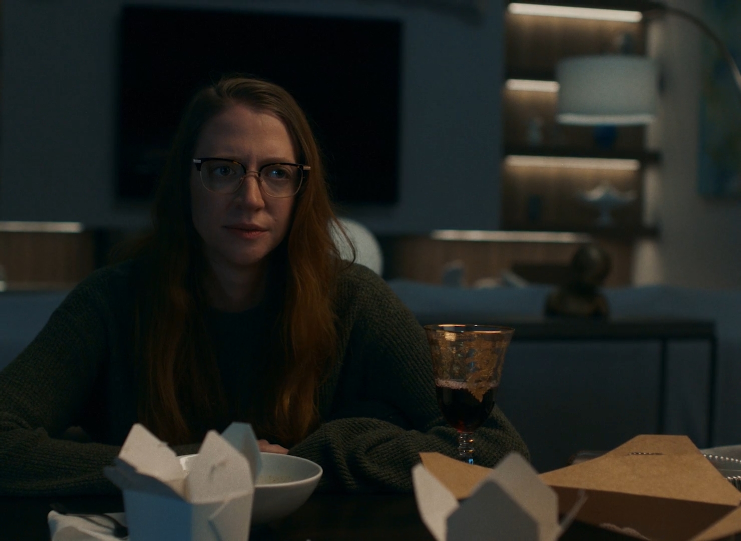 Carey Cox sitting at dining room table at night in Where Did the Adults Go movie