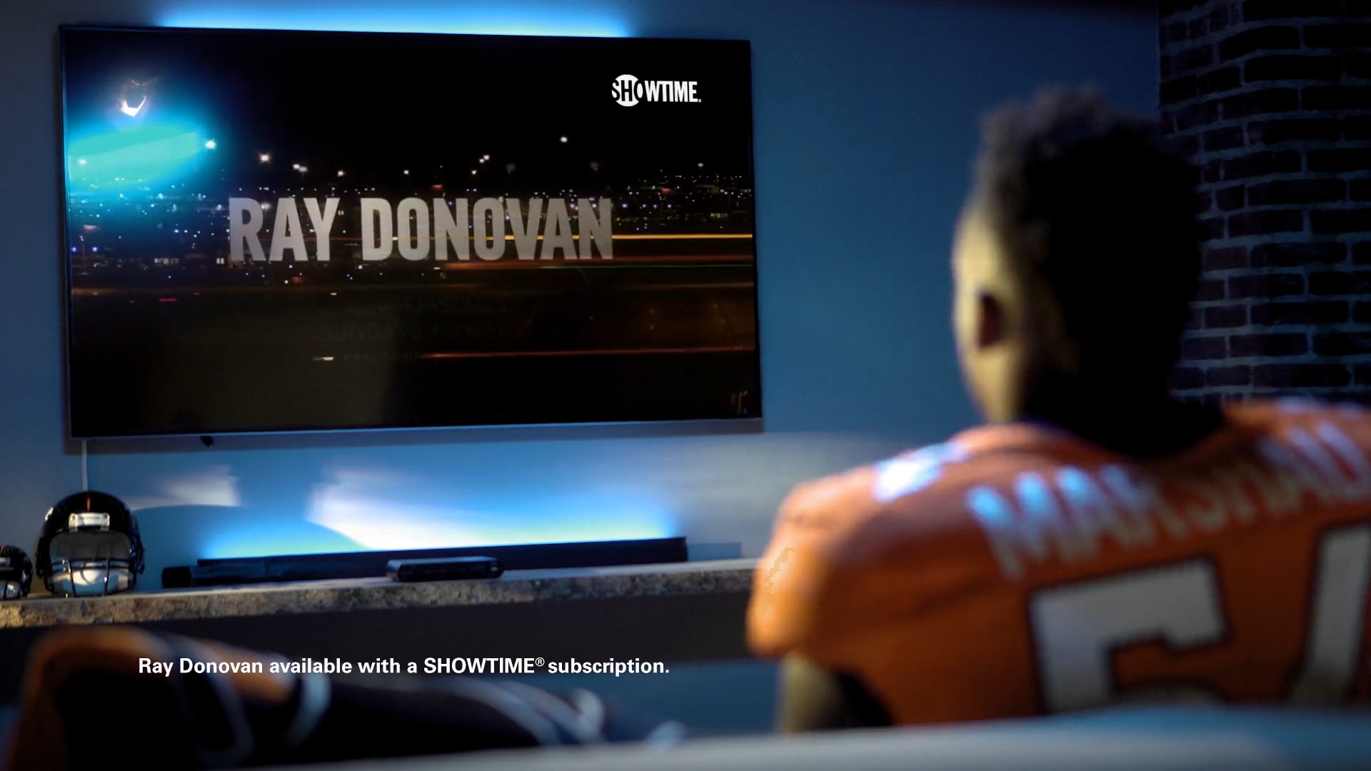 Over the shoulder shot looking at a TV