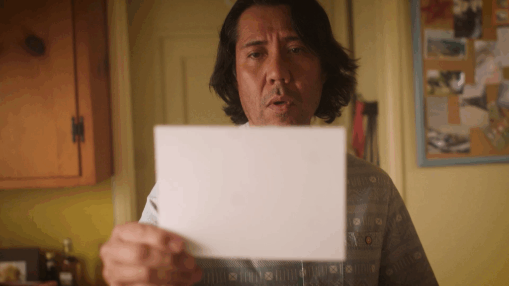 Man looking at a photo