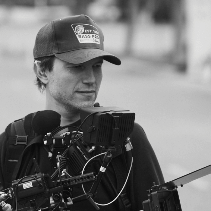 Director of Photography Maximilian Schmige holding a camera