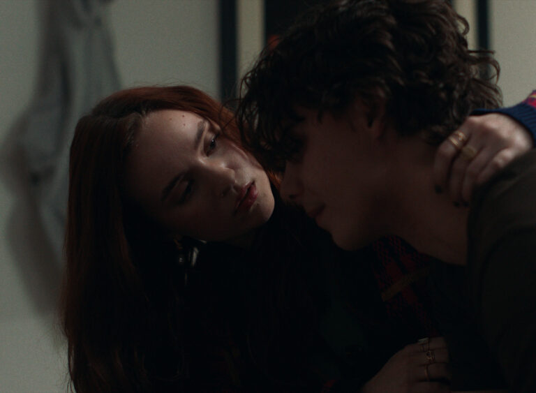 Samantha Rose Baldwin comforting Carson MacCormac