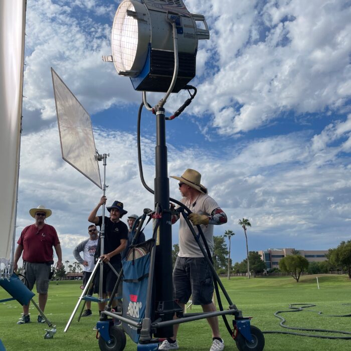 18K HMI Movie light on crankovator stand on movie set