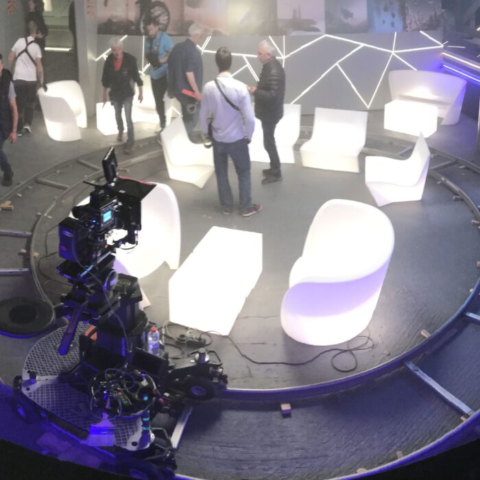 360 circular dolly track set up on movie set inside a sci-fi futuristic bar