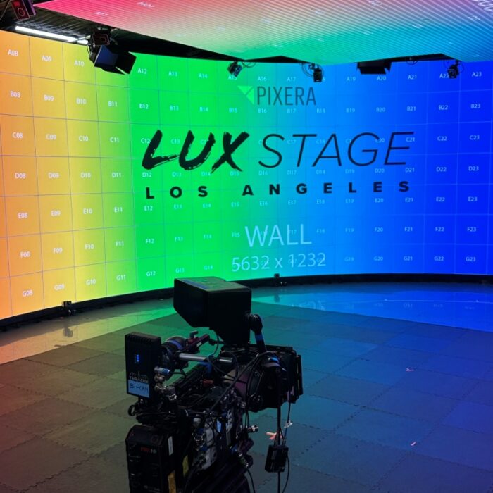 Lux Machina stage wall set up with red v-raptor camera in the foreground
