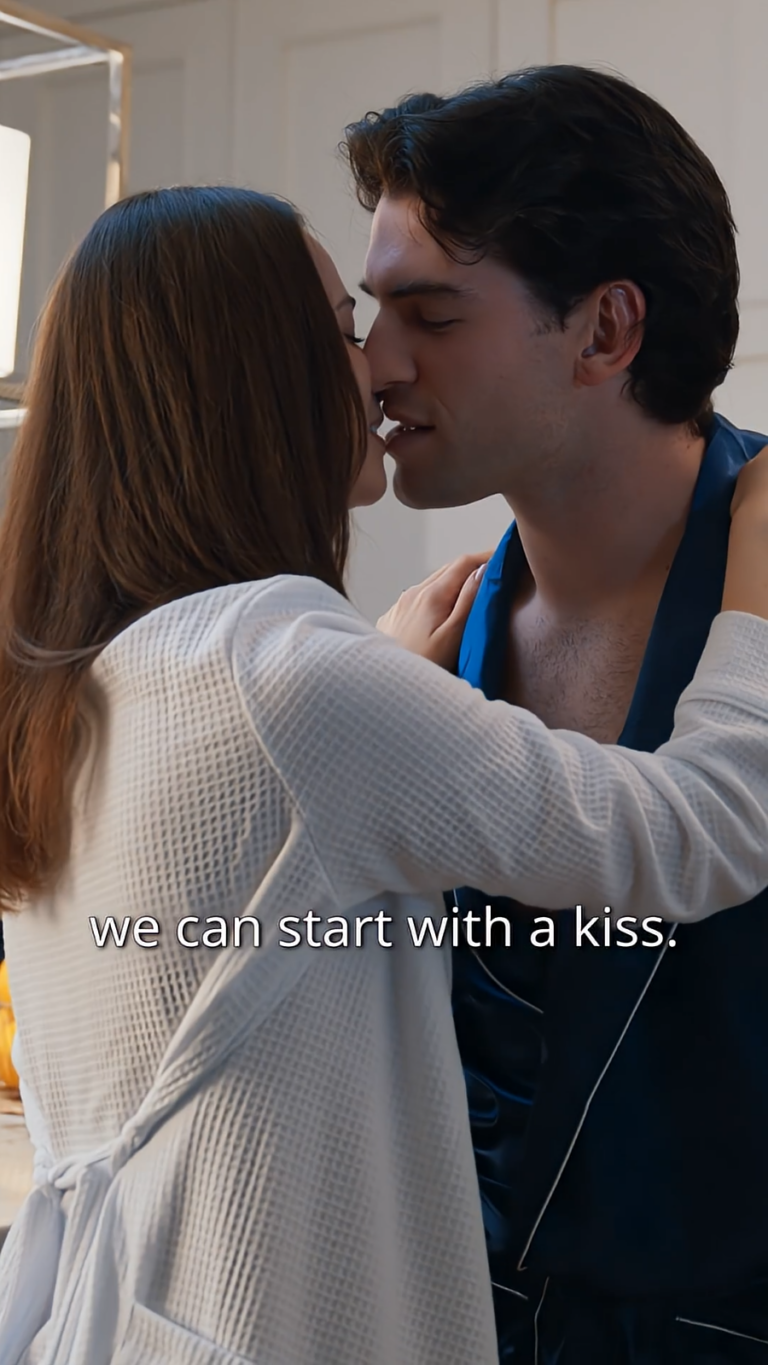 Close up Noah Fearnley as William Gordon and Chena Verony as Pauline Stewart kissing