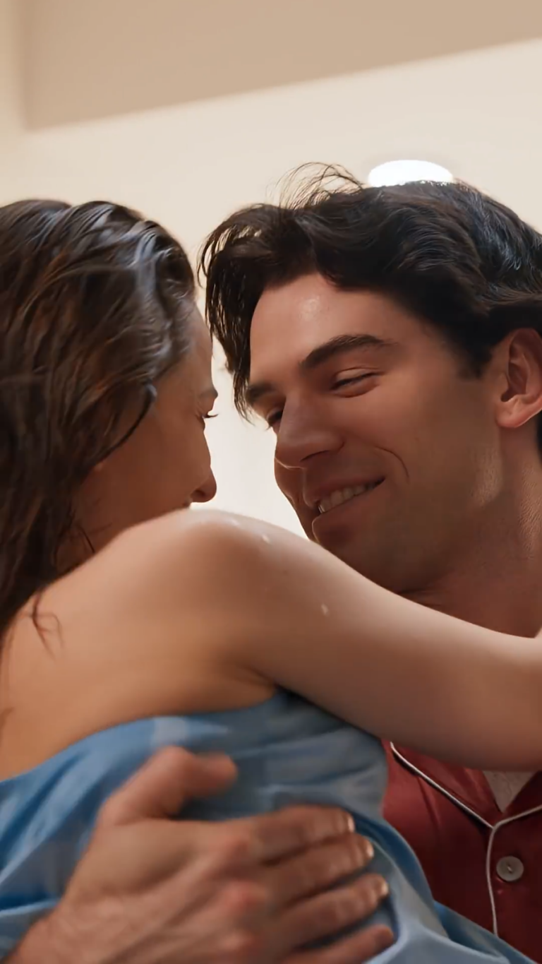 Close up Noah Fearnley holding Chena Verony in arms