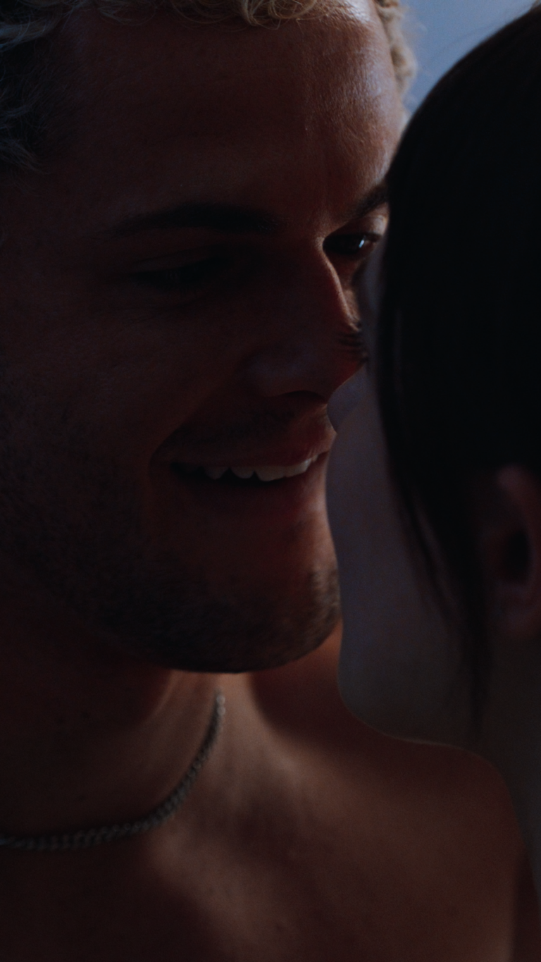 Jarod Staub leaning in to kiss