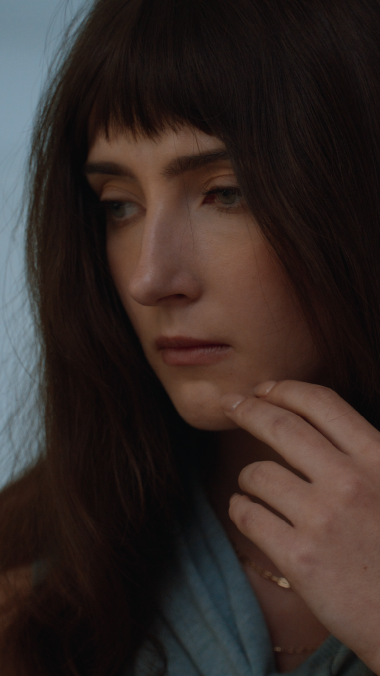 Close up of Tess Dinerstein deep in thoughts