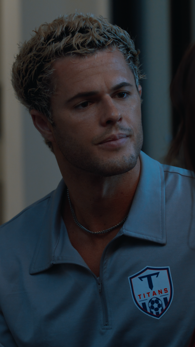Close up of Jarod Staub at night in blue light
